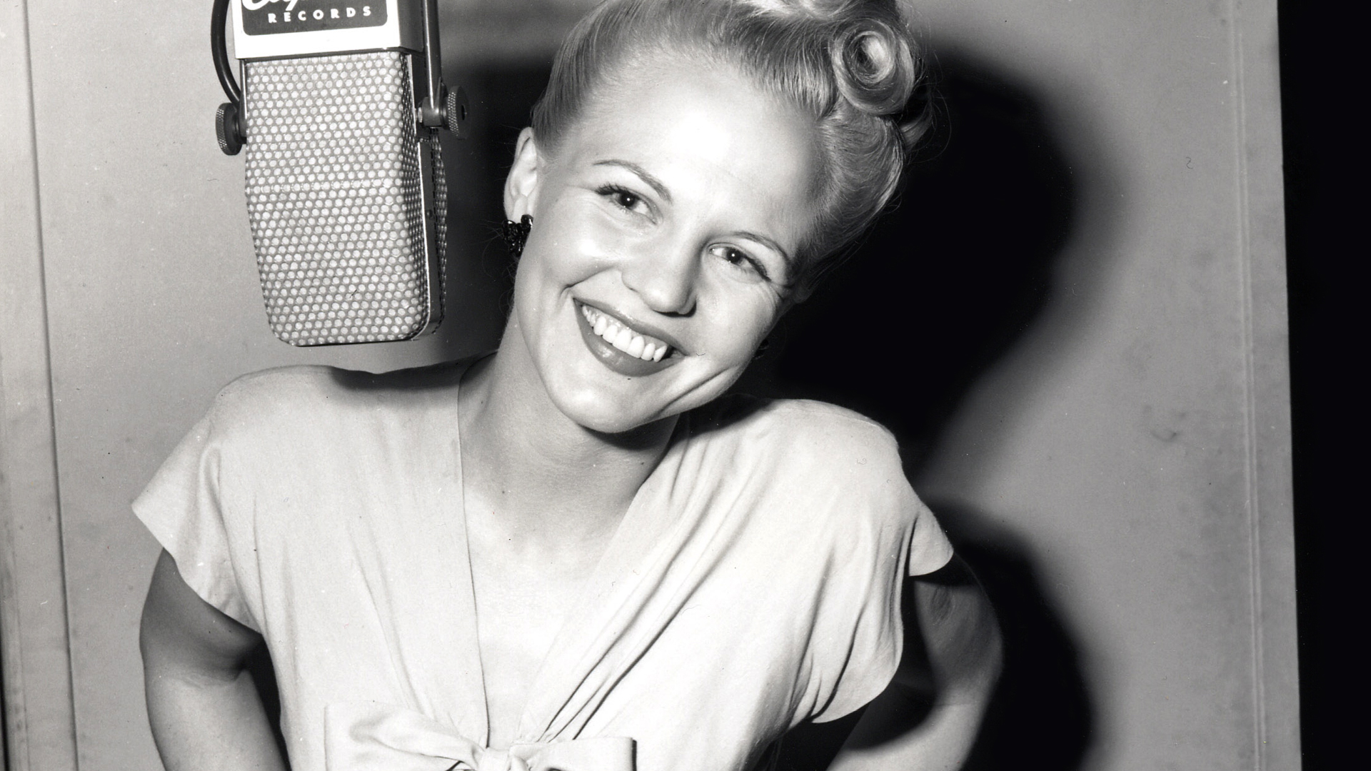 Santa Claus Is Comin' To Town av Peggy Lee